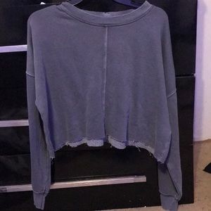 grey cropped shirt . size L but fits like a Medium